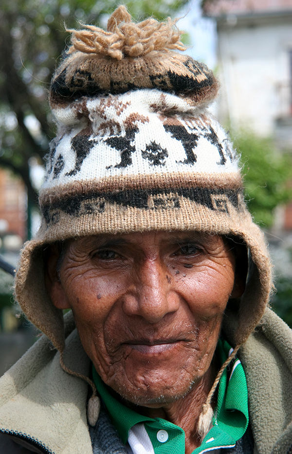 Close up portrait of a senior men posing in the suburb district of La Paz. La Paz is the administrative capital of Bolivia, as well as the departmental capital of the La Paz Department, and the second largest city in the country (in population) after Santa Cruz de la Sierra Close up portrait of a senior men posing in the suburb district of La Paz. La Paz is the administrative capital of Bolivia, as well as the departmental capital of the La Paz Department, and the second largest city in the country (in population) after Santa Cruz de la Sierra